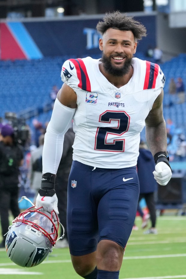 Patriots linebacker Harold Landry runs off the field after an NFL victory over the Tennessee Titans. (AP Photo/George Walker IV)