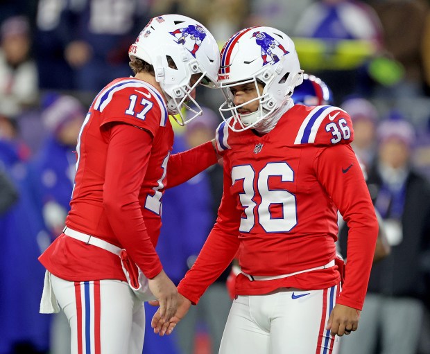 New England Patriots Bryce Baringer (17) celebrates an Andy Borregales field goal during the first quarter of a NFL game against the New York Giants at Gillette Stadium on Dec. 1. (Photo By Matt Stone/Boston Herald)