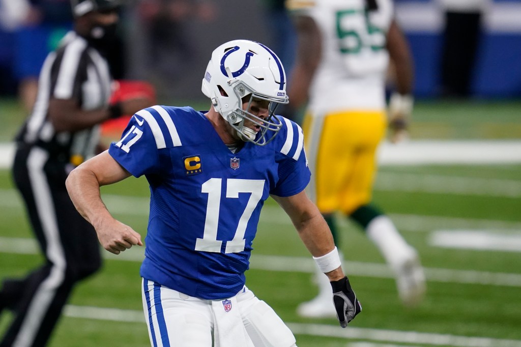 Indianapolis Colts quarterback Philip Rivers (17) reacts after throwing a touchdown pass.