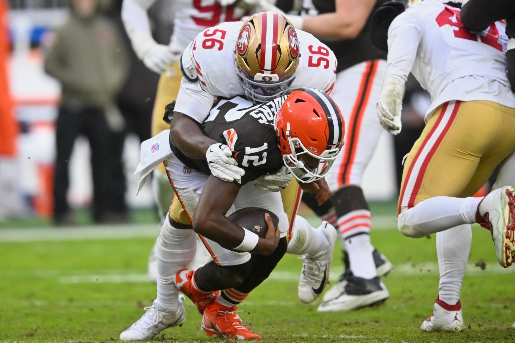 San Francisco 49ers defensive lineman Keion White (56) sacks Cleveland Browns quarterback Shedeur Sanders (12).