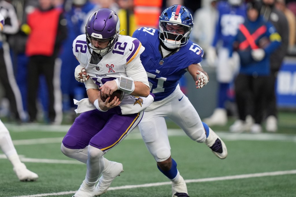 New York Giants linebacker Abdul Carter (51) sacks Minnesota Vikings quarterback Max Brosmer (12).