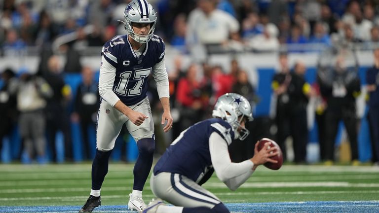 Dallas Cowboys kicker Brandon Aubrey (17), with Bryan Anger holding, attempts a field goal against the Detroit Lions during the second half of an NFL football game Thursday, Dec. 4, 2025, in Detroit. (AP Photo/Ryan Sun)