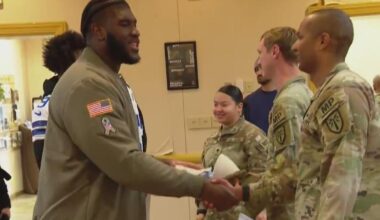 Dallas Cowboys players, cheerleaders visit with soldiers at Fort Sill