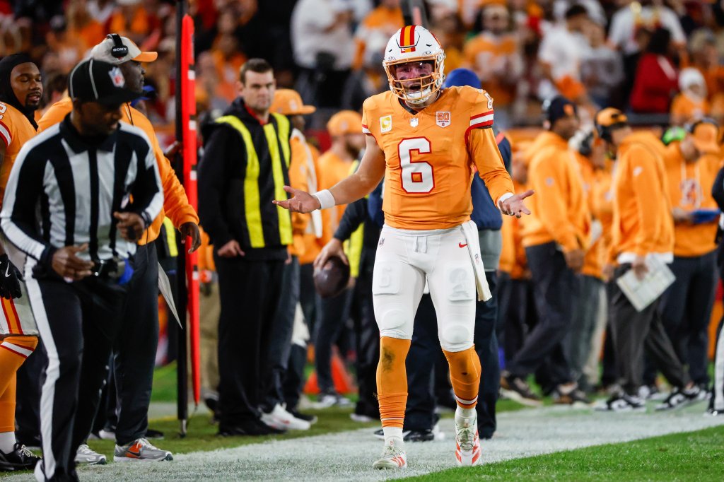Tampa Bay Buccaneers quarterback Baker Mayfield (6) questions the referee about a non-pass interference call.
