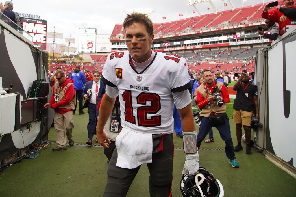 Tampa Bay Buccaneers quarterback Tom Brady (12) leaves the field after beating the Philadelphia Eagles 31-15 on Sunday, January16, 2022 in Tampa.  