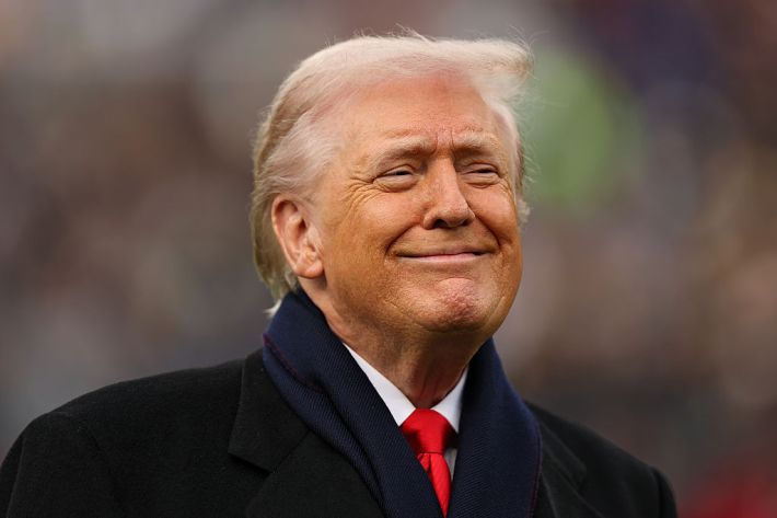 BALTIMORE, MARYLAND - DECEMBER 13: U.S. President Donald Trump smiles from the field before the 126th America's Game between the Army Black Knights and the Navy Midshipmen at M&T Bank Stadium on December 13, 2025 in Baltimore, Maryland. The teams are competing for the Commander-in-Chief's Trophy, with President Trump attending the rivalry for the second consecutive year.