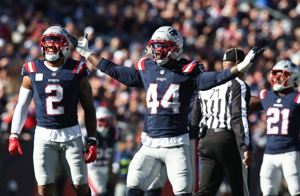 Foxboro, MA -New England Patriots linebacker K'Lavon Chaisson celebrates a sack during the first quarter of the game at Gillette Stadium. (Nancy Lane/Boston Herald)