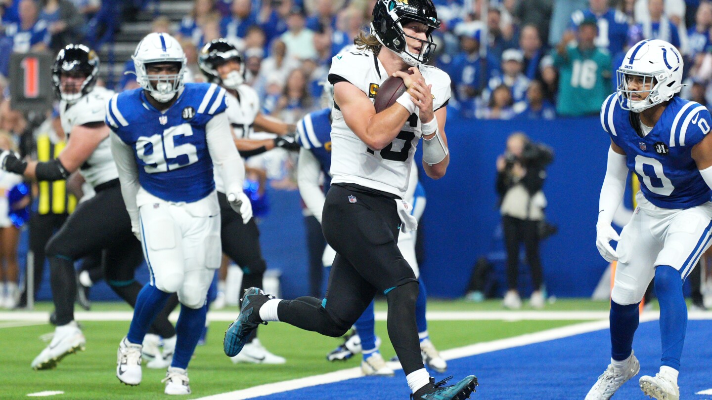 Lawrence runs for 2 scores and Jaguars beat Colts 23-17 for 7th straight win