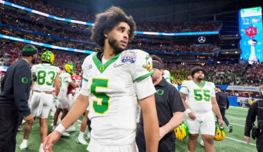 Oregon quarterback Dante Moore walks the field after the Ducks’ loss as the Oregon Ducks face the Indiana Hoosiers in the Peach Bowl on Jan. 9, 2026, at Mercedes-Benz Stadium in Atlanta, Georgia.