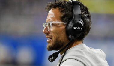 Aug 16, 2025; Detroit, Michigan, USA; Former Miami Dolphins head coach Mike McDaniels looks on from the sidelines in their game against the Detroit Lions in the first quarter at Ford Field.