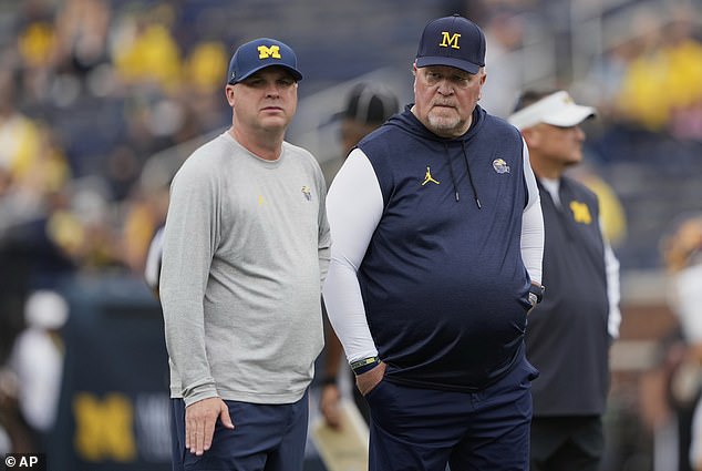 A new report claimed that Moore would clash with Martindale (right) in the buildup to his firing