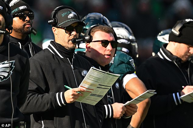 The 44-year-old Patullo (baseball hat, glasses) had one year as offensive coordinator