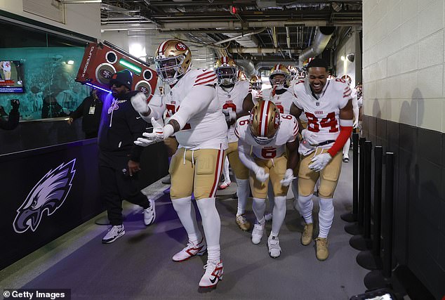 The team had an elaborate dance routine - along with a boombox - before they took to the field (Pictured: 49ers walk-out prior to their game against the Philadelphia Eagles on January 11th)