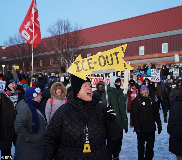 People gather for a vigil blocks from where Alex Pretti was fatally shot by federal agents in south Minneapolis. Allen's comments were made before Pretti was killed by US Border agents