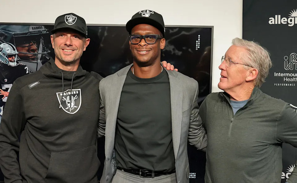 HENDERSON, NEVADA - APRIL 07: (L-R) General manager John Spytek of the Las Vegas Raiders, quarterback Geno Smith and head coach Pete Carroll of the Raiders pose after a news conference introducing Smith at the Las Vegas Raiders Headquarters/Intermountain Healthcare Performance Center on April 07, 2025 in Henderson, Nevada. (Photo by Ethan Miller/Getty Images)