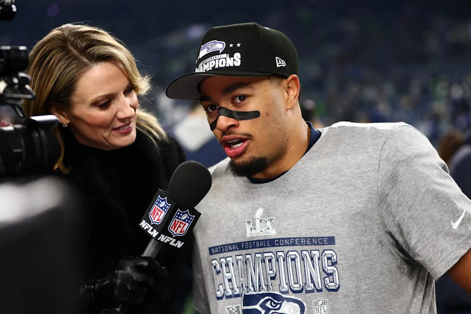 Seattle Seahawks wide receiver Jaxon Smith-Njigba (11) is interviewed after defeating the Los Angeles Rams in the 2026 NFC Championship Game.Mandatory Credit&colon; Kevin Ng-Imagn Images