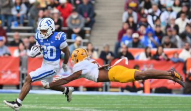 Running back Nate Sheppard #20 of the Duke Blue Devils escapes a diving tackle attempt from defensive back Montana Warren #7 of the Arizona State Sun Devils during the second half of the Tony The Tiger Sun Bowl game at Sun Bowl Stadium on December 31, 2025 in El Paso, Texas. The Blue Devils defeated the Sun Devils 42-39.