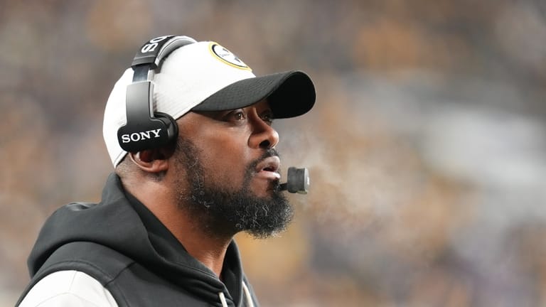 Pittsburgh Steelers head coach Mike Tomlin watches from the sideline...
