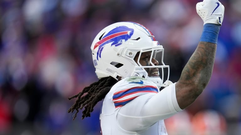 Buffalo Bills running back James Cook III celebrates his touchdown...