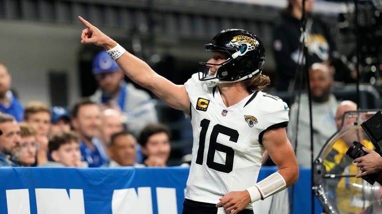 Jacksonville Jaguars quarterback Trevor Lawrence celebrates after scoring during the...