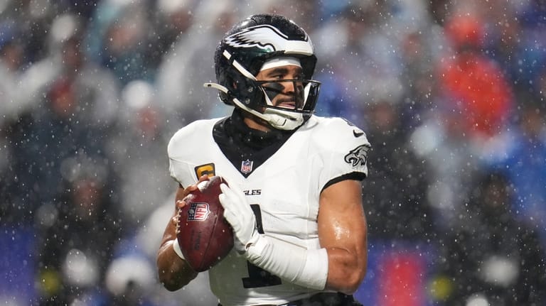 Philadelphia Eagles' Jalen Hurts passes during the second half of...