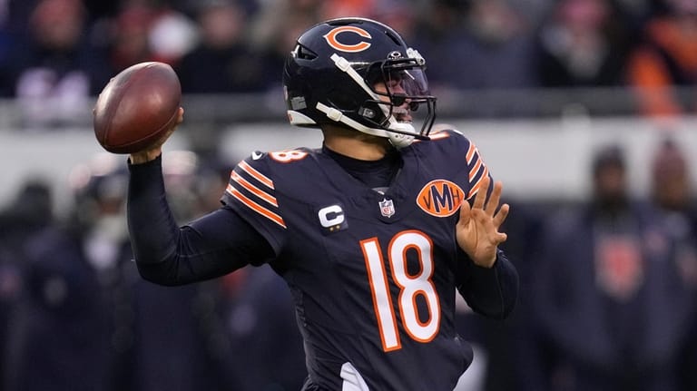 Chicago Bears quarterback Caleb Williams throws a pass during the...