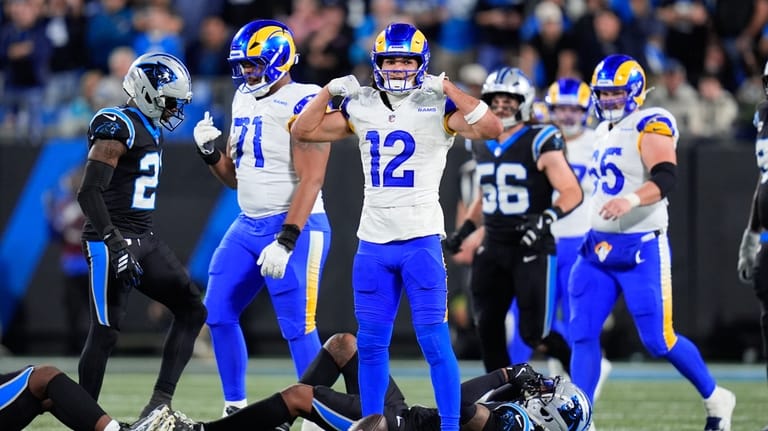 Los Angeles Rams wide receiver Puka Nacua (12) reacts after...