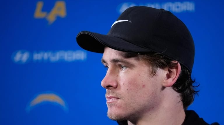 Los Angeles Chargers quarterback Justin Herbert speaks during a news...