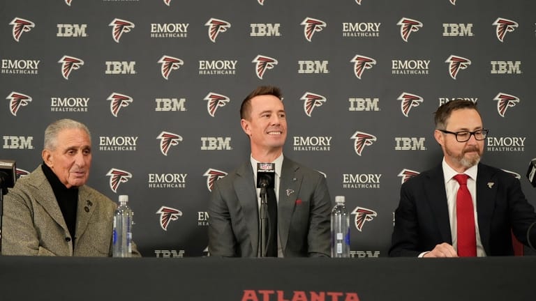 Former Falcons quarterback Matt Ryan speaks during a news conference...