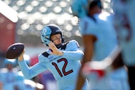  Arlington Renegades quarterback Luis Perez (12) launches a pass downfield during the team's...