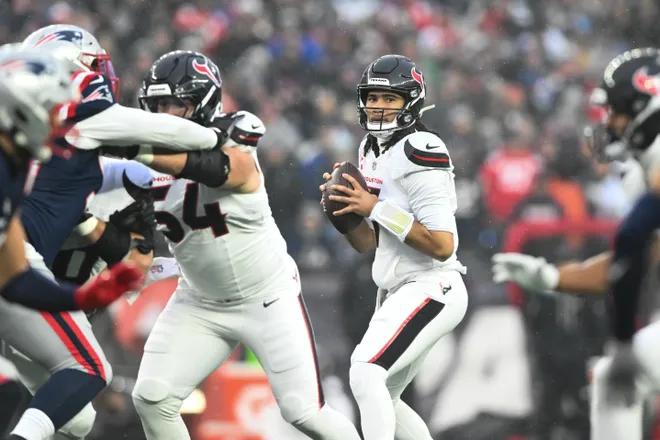 Jan 18, 2026; Foxborough, MA, USA; Houston Texans quarterback C.J. Stroud (7) looks to throw in the first quarter against the New England Patriots in an AFC Divisional Round game at Gillette Stadium. Mandatory Credit: Brian Fluharty-Imagn Images