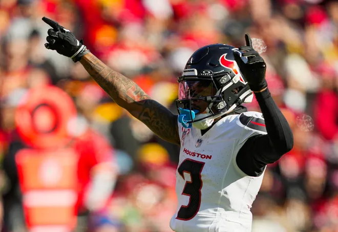 Dec 21, 2024; Kansas City, Missouri, USA; Houston Texans wide receiver Tank Dell (3) celebrates after a play during the first half against the Kansas City Chiefs at GEHA Field at Arrowhead Stadium. Mandatory Credit: Jay Biggerstaff-Imagn Images