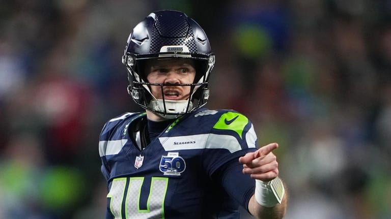 Seattle Seahawks quarterback Sam Darnold reacts during the second half...