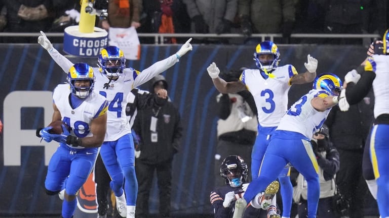 Los Angeles Rams linebacker Jesse Luketa (40) holds the football...