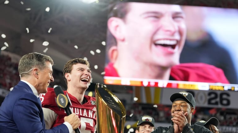 Indiana quarterback Fernando Mendoza smiles after the College Football Playoff...