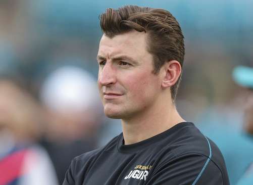 Jacksonville Jaguars offensive coordinator Grant Udinski watches warm-ups before an NFL preseason football game against the Pittsburgh Steelers, Saturday, Aug. 9, 2025, in Jacksonville, Fla. The Steelers defeated the Jaguars 31-25. 