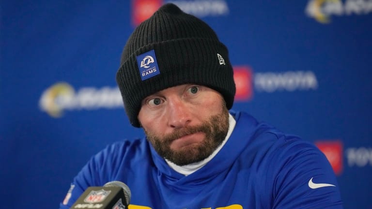 Los Angeles Rams head coach Sean McVay talks to reporters...