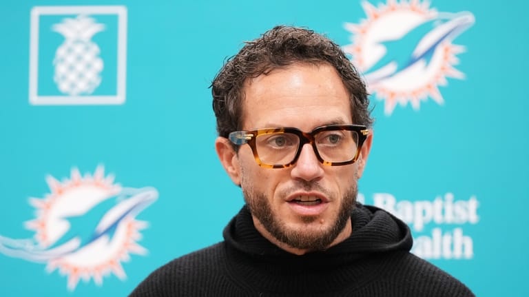 Miami Dolphins head coach Mike McDaniel responds to a question...