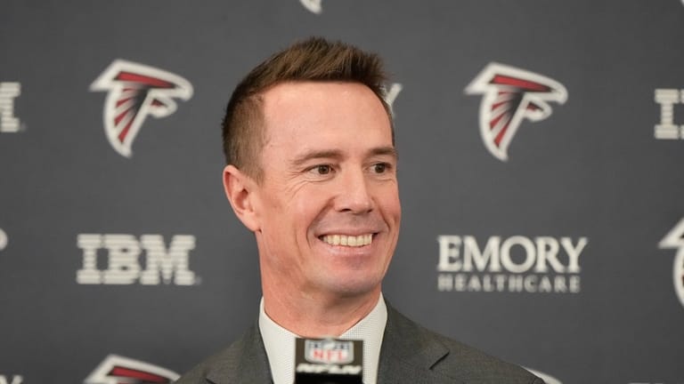 Former Falcons quarterback Matt Ryan speaks during a news conference...