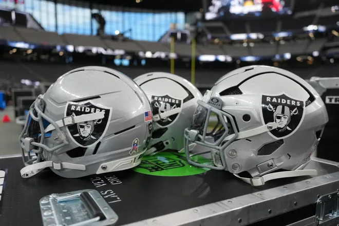 Nov 23, 2025; Paradise, Nevada, USA; Las Vegas Raiders helmets on the sidelines at Allegiant Stadium. Mandatory Credit: Kirby Lee-Imagn Images