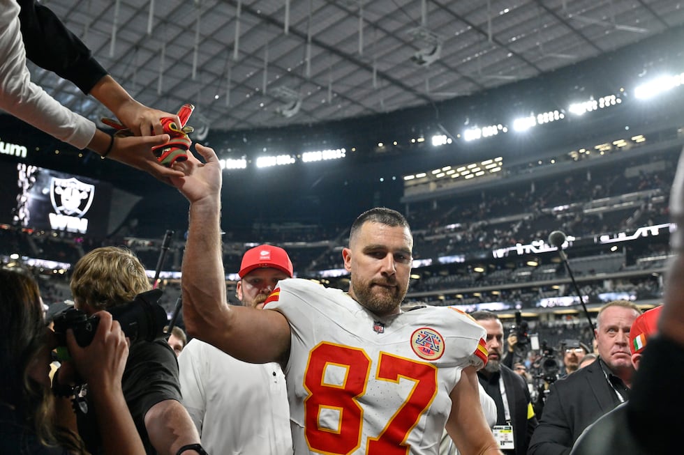 Kansas City Chiefs tight end Travis Kelce heads off the field following an NFL football game...