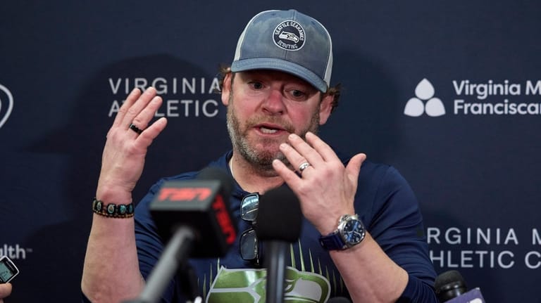 Seattle Seahawks general manager John Schneider speaks during a news...