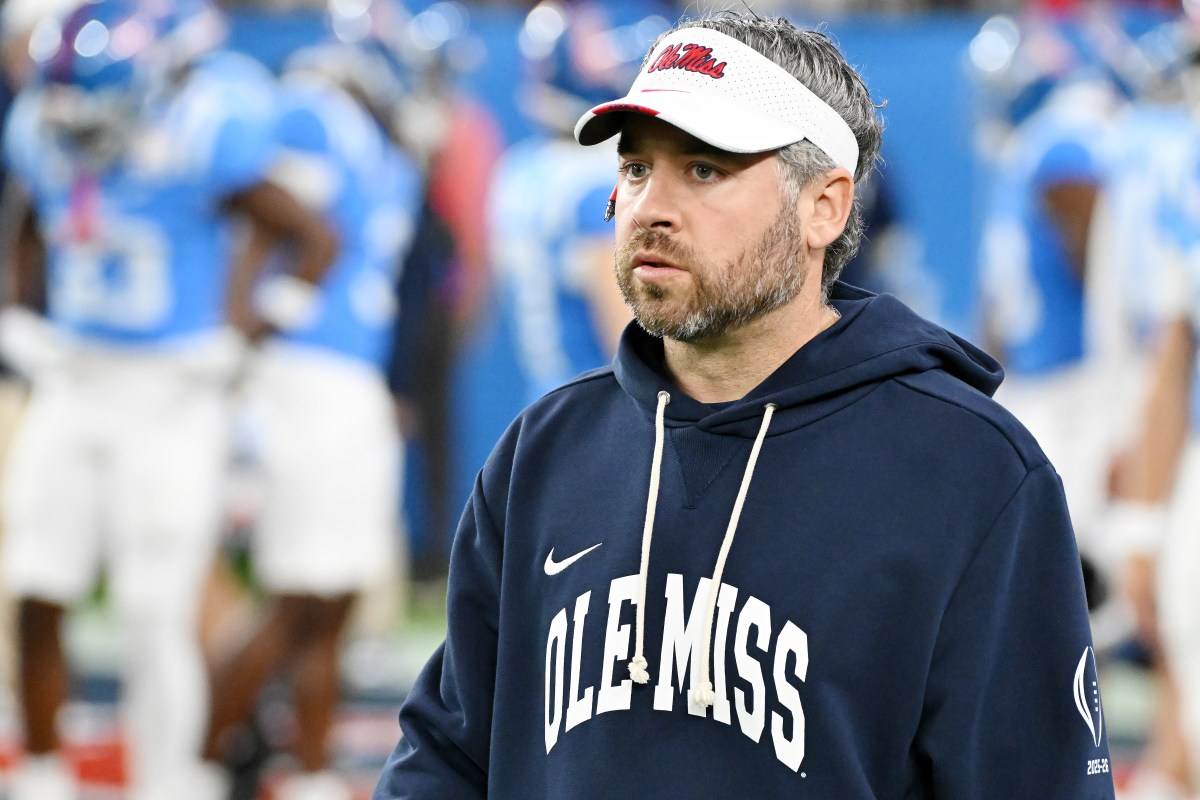 GLENDALE, ARIZONA - JANUARY 08: Head coach Pete Golding of the Ole Miss Rebels looks on during warmups prior to the game against the Miami Hurricanes during the 2025 College Football Playoff Semifinal at the VRBO Fiesta Bowl at State Farm Stadium on January 08, 2026 in Glendale, Arizona. (Photo by Norm Hall/Getty Images)