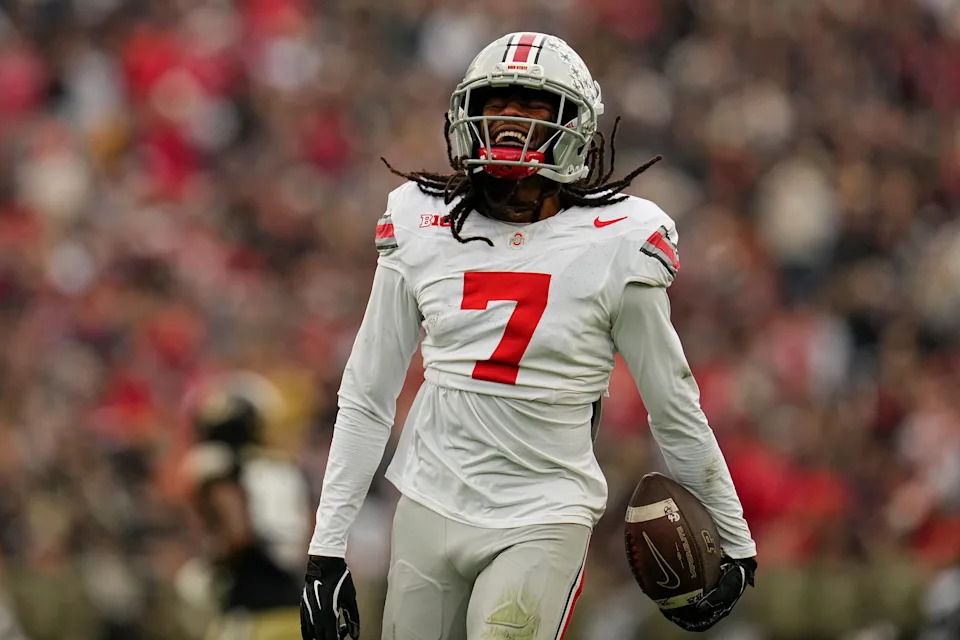 Ohio State Buckeyes cornerback Jermaine Mathews Jr. (7) celebrates an interception during the NCAA football game against the Purdue Boilermakers at Ross-Ade Stadium in West Lafayette, Ind. on Nov. 8, 2025.