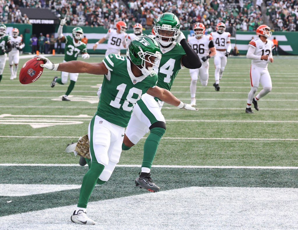 New York Jets player Isaiah Williams #18 scores a touchdown against the Cleveland Browns.