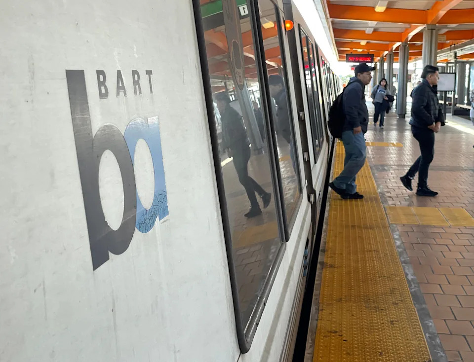 Bay Area Rapid Transit (BART) passengers walk off a train at the Richmond station on March 15, 2023 in Richmond, California.