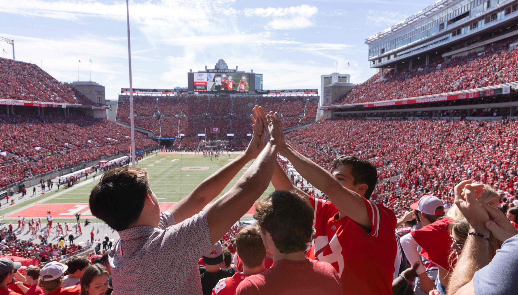 Fans cheer on the Buckeyes at Ohio Stadium
