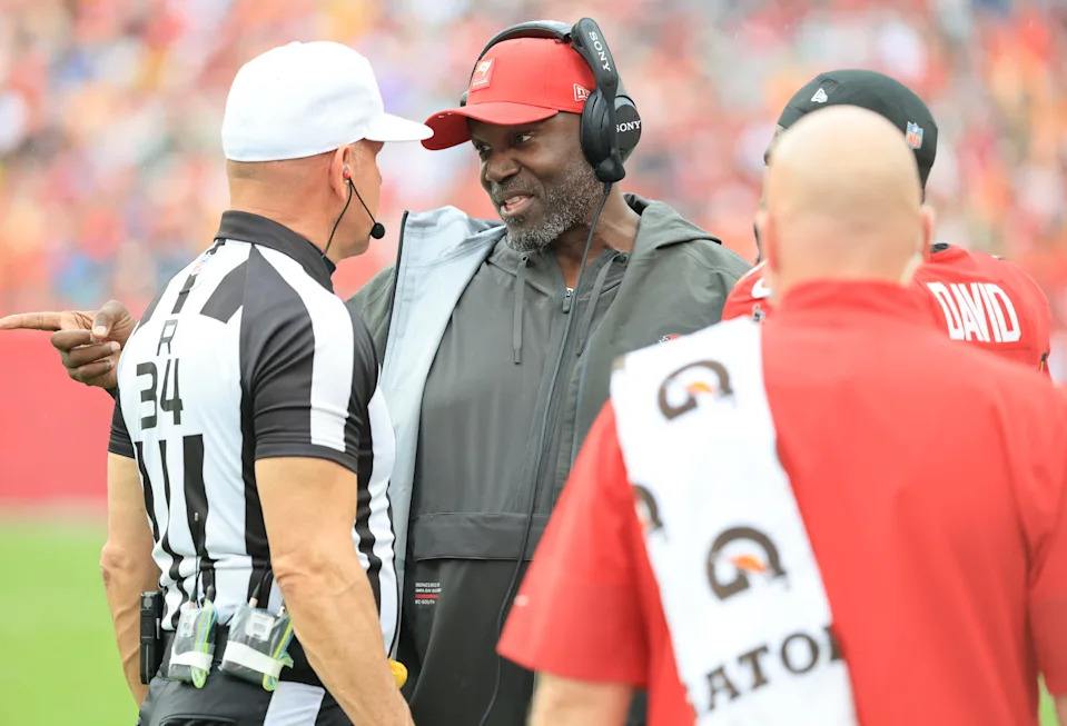 Dec 7, 2025; Tampa, Florida, USA; Tampa Bay Buccaneers head coach Todd Bowles talks with referee Clete Blakeman (34) during the first quarter against the New Orleans Saints at Raymond James Stadium. Mandatory Credit: Kim Klement Neitzel-Imagn Images
