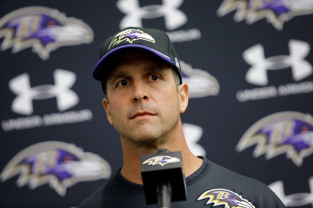 John Harbaugh, head coach for the Baltimore Ravens, speaks at a news conference.