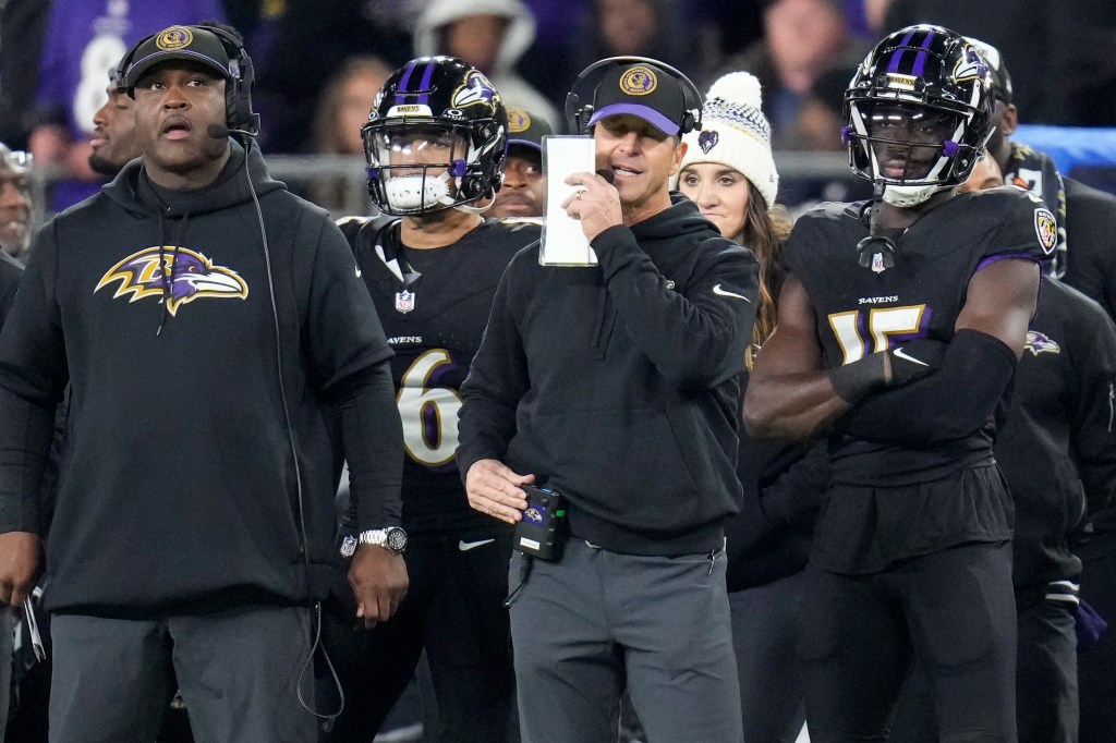 Baltimore Ravens head coach John Harbaugh stands on the sideline in the fourth quarter against the Cincinnati Bengals at M&T Bank Stadium.